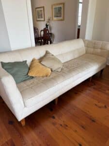 03-tufted-cream-sofa