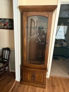 Oak-Gun-Cabinet-with-Lower-Storage