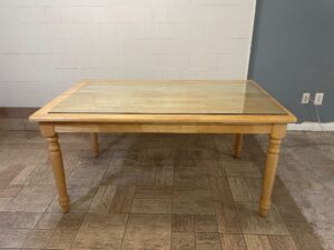 Light-Pine-Farmhouse-Dining-Table-with-Glass-Top