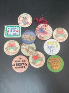 Assorted-Collectible-Pins-and-Keychains-Vintage-and-Themed