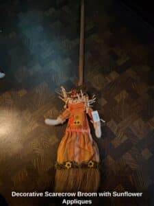 Decorative-Scarecrow-Broom-with-Sunflower-Appliques