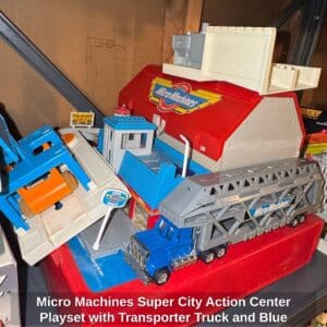 Micro-Machines-Super-City-Action-Center-Playset-with-Transporter-Truck-and-Blue-Truck-1
