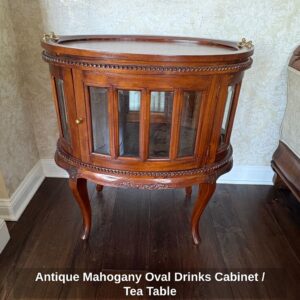 Antique-Mahogany-Oval-Drinks-Cabinet-or-Tea-Table