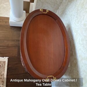 Antique-Mahogany-Oval-Drinks-Cabinet-or-Tea-Table-second-image