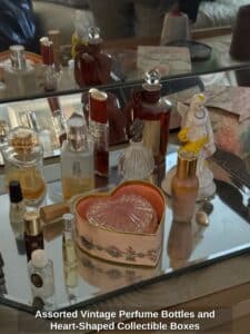 Assorted-Vintage-Perfume-Bottles-and-Heart-Shaped-Collectible-Boxes