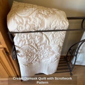 Cream-Damask-Quilt-with-Scrollwork-Pattern