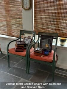 Vintage-Metal-Garden-Chairs-with-Cushions-and-Stacked-Decor