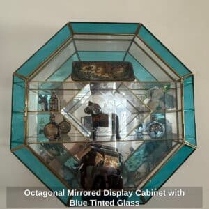 Octagonal-Mirrored-Display-Cabinet-with-Blue-Tinted-Glass