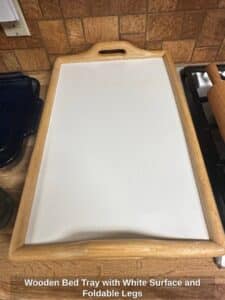 Wooden-Bed-Tray-with-White-Surface-and-Foldable-Legs