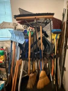 Assorted-Garden-Tools-and-Brooms-with-Tool-Organizer