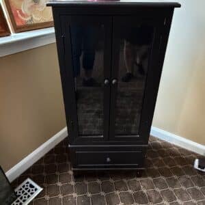 Black-Armoire-Cabinet-with-Mirrored-Doors-and-Drawer