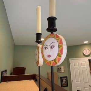 Folk-Art-Sun-and-Moon-Face-Candlestick-Holders-second-image
