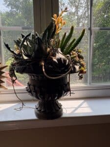 Ornate-Urn-Planter-with-Succulents-and-Frog-Figurine