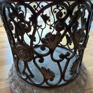 Round-Glass-Top-Dining-Table-with-Ornate-Forged-Iron-Base-second-image