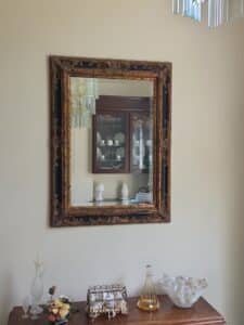 Ornate-Gilt-and-Black-Hollywood-Regency-Style-Mirror