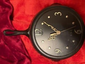 Cast-Iron-Skillet-Wall-Clock-with-Ornate-Hands