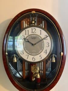 Rhythm-Small-World-Solo-Organist-Musical-Wall-Clock