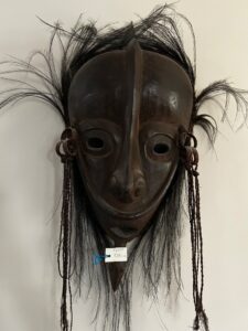 A Life Well Traveled & Well Read - Global Artifacts, African Masks, Books, MCM Furniture, Tools