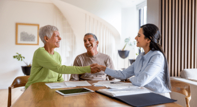 Senior couple meeting with professional estate sale company