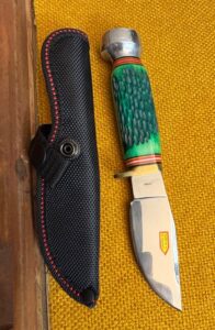 Steel-Warrior-Buck-Skinner-Fixed-Blade-Knife-with-Green-Textured-Handle-and-Nylon-Sheath