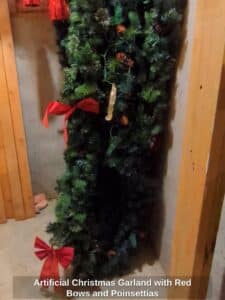 Artificial-Christmas-Garland-with-Red-Bows-and-Poinsettias-second-image