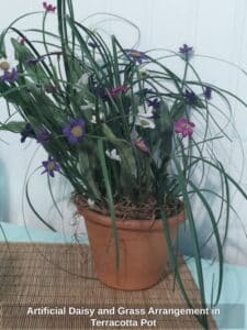 Artificial-Daisy-and-Grass-Arrangement-in-Terracotta-Pot