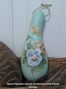 Hand-Painted-Gourd-Ornament-with-Floral-Design