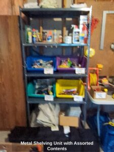 Metal-Shelving-Unit-with-Assorted-Contents