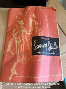 Singer-Featherweight-Sewing-Machine-with-Accessories-and-Manual-second-image