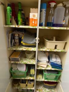 Assorted-Household-Cleaning-Supplies-and-Storage-Organizers-in-Utility-Cabinet