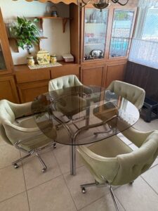 Vintage-Chrome-and-Smoked-Glass-Dining-Set-with-Rolling-Chairs