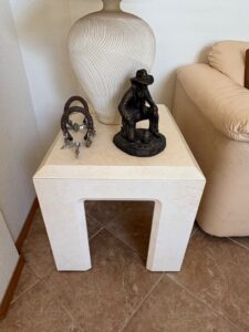Western-Cowboy-Figurine-Vintage-Spurs-and-Tessellated-Stone-Side-Table