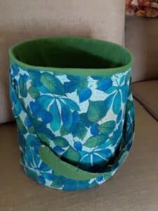 Vintage-Fabric-Storage-Bin-with-Leaf-Pattern