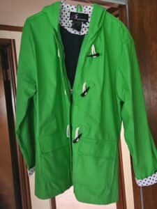Womens-Green-Raincoat-with-Toggle-Closures
