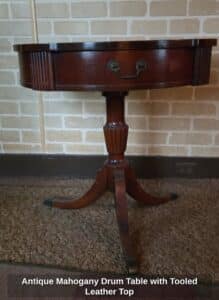 Antique-Mahogany-Drum-Table-with-Tooled-Leather-Top
