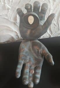 Bronze-Hand-Sculpture-with-Face