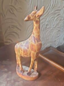 Carved-wooden-giraffe-figurine