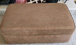 Brown-Upholstered-Storage-Ottoman