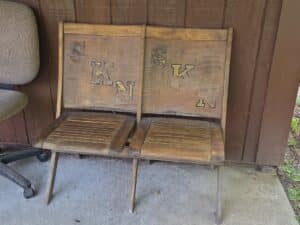 Double-Folding-Theater-Seats-with-Stenciled-Letters