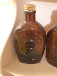 Log-Cabin-Bicentennial-Amber-Glass-Bottle