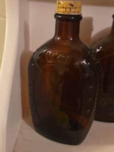 Log-Cabin-Bicentennial-Amber-Glass-Bottle-second-image
