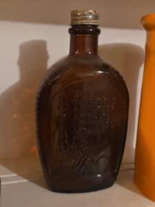 Log-Cabin-Syrup-Statue-of-Liberty-Bicentennial-Bottle