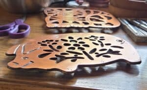 Vintage-Copper-Cat-and-Pig-Trivets-second-image