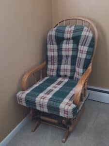 Wooden-Spindle-Glider-Rocker-with-Plaid-Cushions