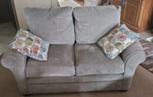 Grey-Upholstered-Loveseat