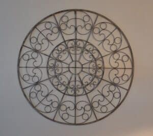 Large-Round-Metal-Wall-Medallion-with-Scrollwork-second-image