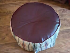 Round-upholstered-ottoman-second-image