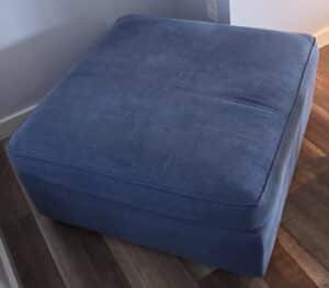 Square-Upholstered-Ottoman-on-Casters
