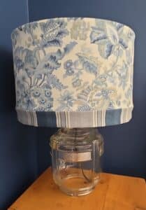 Upcycled-Vintage-Glass-Refrigerator-Pitcher-Lamp-with-Blue-Floral-Shade