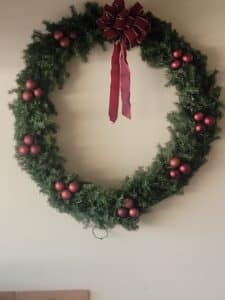 Artificial-Christmas-Wreath-with-Red-Ornaments-and-Burgundy-Bow